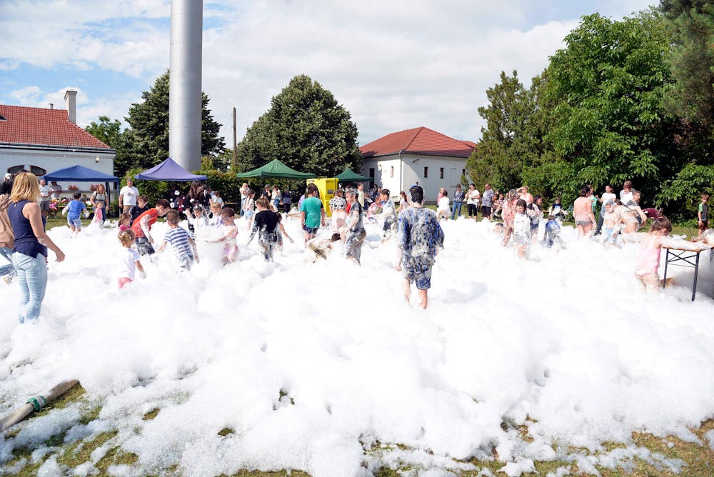 Families enjoying a big outdoor foam party in Miami